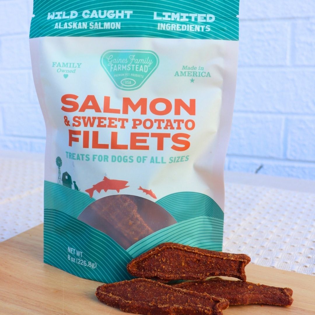 Salmon & Sweet Potato Fillets treats displayed beside their Gaines Family Farmstead bag