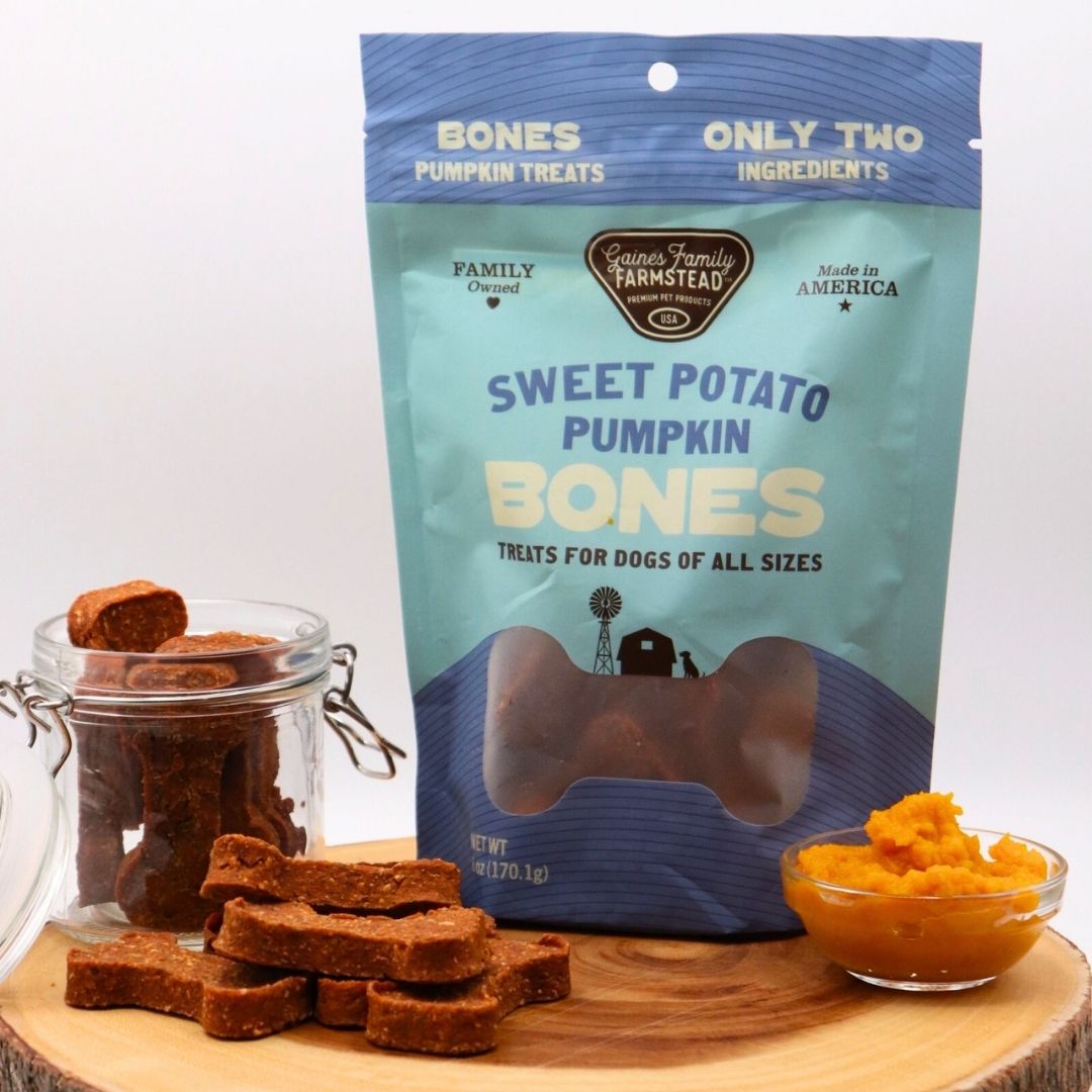 Sweet potato pumpkin bones beside their bag and a treat jar